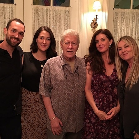 A picture of Emily Trebek with her parents and elder brother.